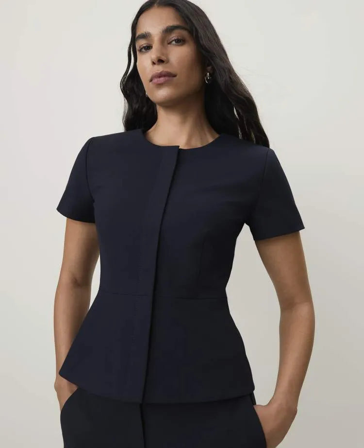 The Petite Crew Neck Peplum Top in Seasonless Stretch